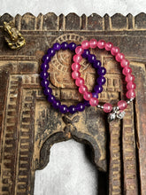 Load image into Gallery viewer, Pair of natural crystal gemstone stacking bracelets with Lotus Flower & Seed Pod charms - Amethyst & Pink Chalcedony