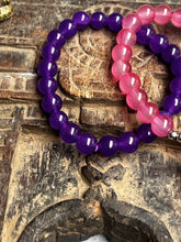 Load image into Gallery viewer, Pair of natural crystal gemstone stacking bracelets with Lotus Flower & Seed Pod charms - Amethyst & Pink Chalcedony