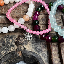 Load image into Gallery viewer, Stack of 4 natural crystal gemstone stacking bracelets with clover & lotus seed/flower charms