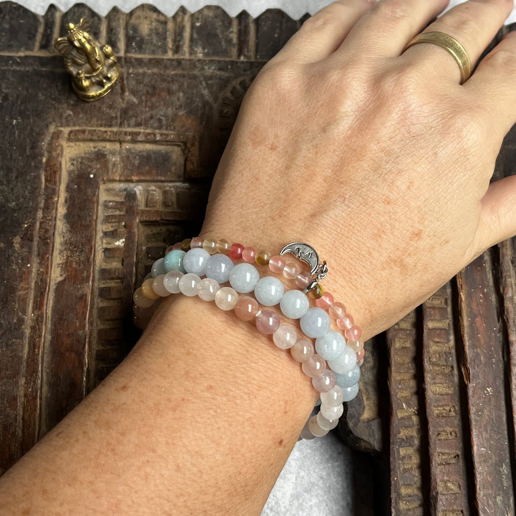 Trio of natural crystal gemstone stacking bracelets with moon charm