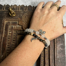 Load image into Gallery viewer, Pair of natural crystal gemstone stacking bracelets with moon &amp; lotus seed/flower charms
